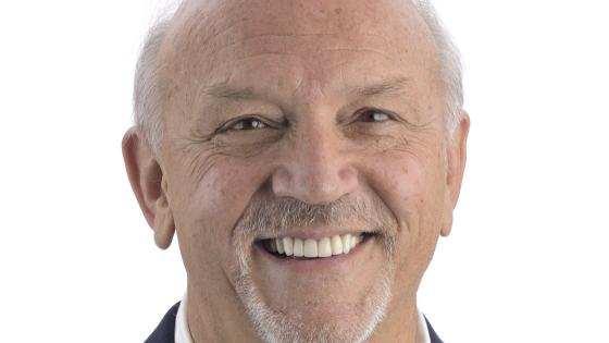 a profile photograph of Russell Cox