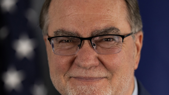 a profile photograph of John Langefeld
