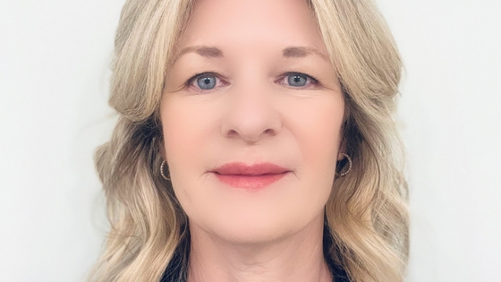 a profile photograph of Debbie Miller