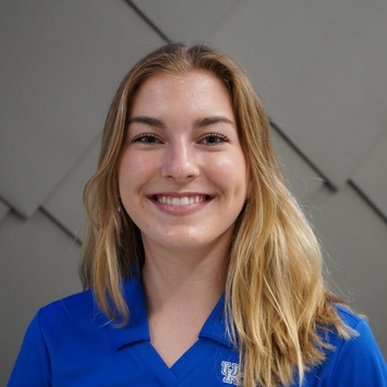 a profile photograph of Ashley Grospitch