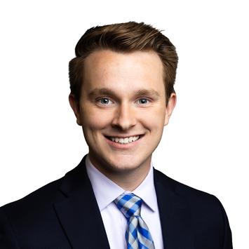 a profile photograph of Rex Norvell